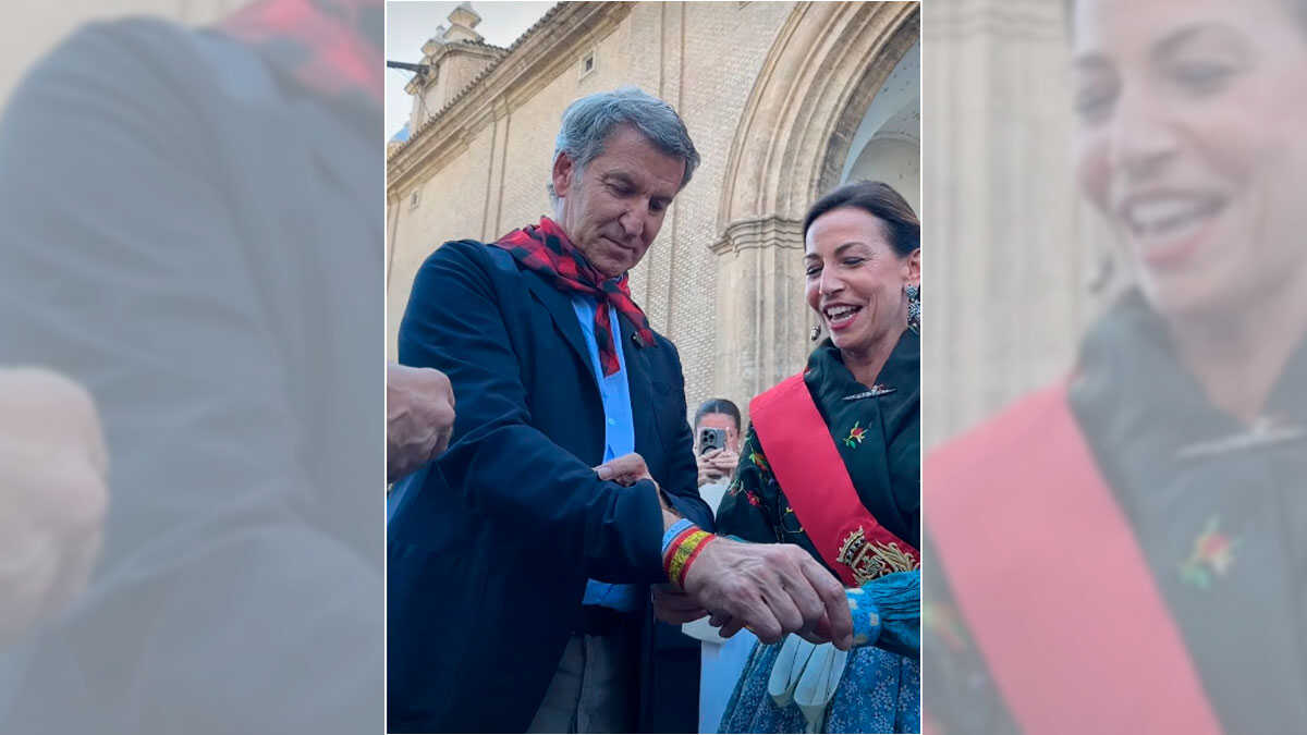 Chueca accueille Feijóo avec un ruban de la Vierge lors de l’Offrande des Fruits : « Pour le futur président de l’Espagne »